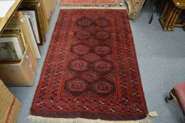 A Persian carpet in the Bokhara style.