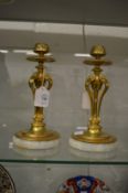 A good pair of Arts & Crafts brass candlesticks on onyx bases.