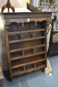 A continental walnut or fruitwood plate rack.