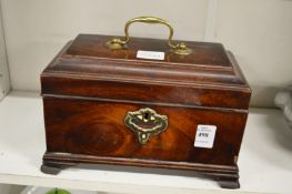 A George III mahogany tea caddy.