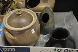 A large jar and cover, an unusual vase and another vase.
