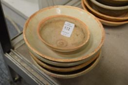 Five Chinese terracotta bowls.