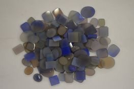 A box of blue agate, unmounted.