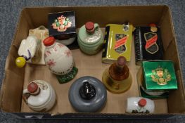 A good small collection of miniature whisky bottles, various shapes to include barrels, a rugby