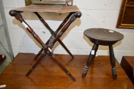 A mahogany folding stool together with a carved stool 
