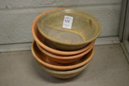 Five Chinese terracotta bowls.