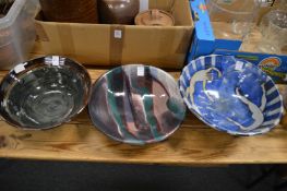 Three studio pottery bowls.