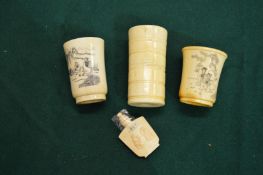 Chinese bone dice shakers and a snuff bottle.