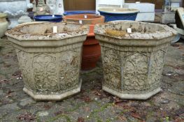 A good pair of Gothic revival octagonal shaped reconstituted stone garden planters.