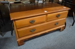 A yew wood TV and video cabinet.