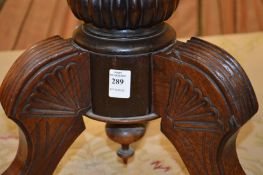 A Victorian rosewood revolving music seat.