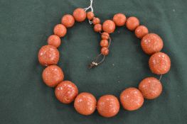 A chunky bead necklace.