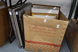 A quantity of paintings and prints.