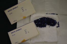 Packets containing blue sapphires and white spinels etc.
