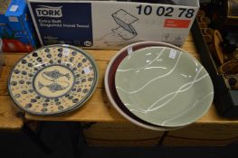 Four pottery dishes.