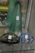 A pair of moulded glass dishes together with a green opaque glass trumpet shaped vase, signed.