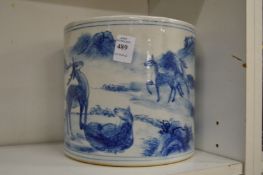 A large Chinese blue and white brush pot.