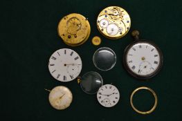 Various watch parts.