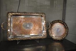 A large plated twin handled tray with grape and vine border together with the matching circular