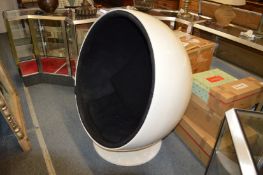 A 1960's / 70's fibreglass globe shaped swivel chair.