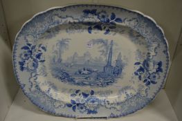 A large blue and white transfer printed meat dish.