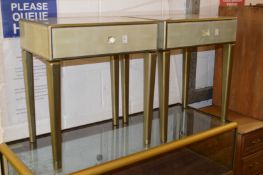A pair of stylish faux shagreen single drawer bedside tables (some glass damage).