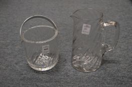 A moulded glass ice bucket and similar jug.
