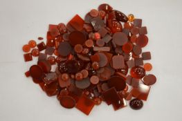 A box of cornelian stones, unmounted.