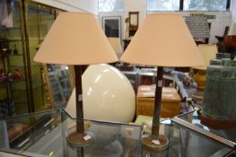 A pair of table lamps.