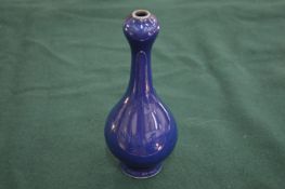 A small Chinese blue ground double gourd shaped bottle vase.