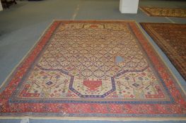 A large early 20th century Persian carpet of unusual design (faults).