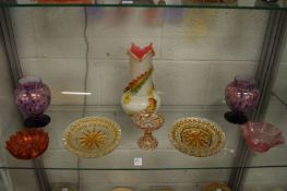 A good collection of decorative glassware to include an opaque vase with applied moulded