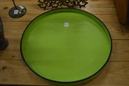 A David Linley circular bright green leather tray.