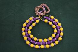 A colourful bead necklace.