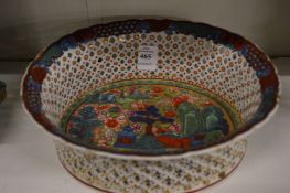 A Chinese pierced porcelain oval shaped bowl.