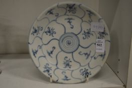 A Tek Sing cargo blue and white dish with certificate of authenticity.