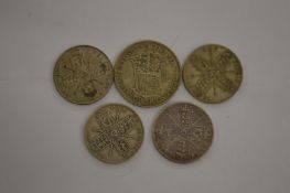 Four Victorian and later florins and a half crown.