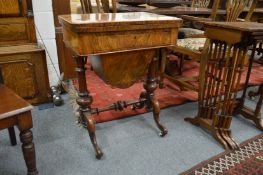 A Victorian figured walnut foldover combination games / work table.
