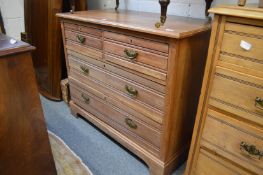 A Victorian walnut chest of drawers.