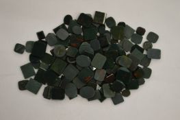 A box of unmounted bloodstones.