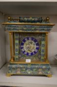 An unusual cloisonne enamel decorated mantle clock.