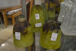 Daum, three green and brown opaque glass lampshades.