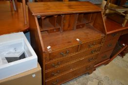 A yew wood bureau, a modern dressing table and a pine side table (AF).