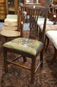 A 19th century elm dining chair.