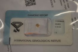 A single diamond, unmounted.