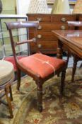A set of four William IV rosewood dining chairs.