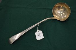 A silver ladle.
