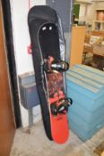 A snow board and travelling case.