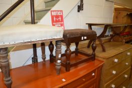 Two stools and a coffee table.