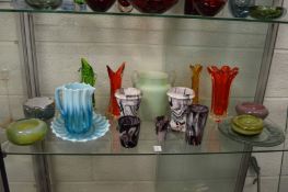 A good collection of colourful glassware to include Slag glass vases, opaque ribbed glass jug and